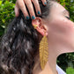 Long Plaintain Leaf earrings Nature’s Grace, Worn with Elegance