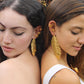 Long Plaintain Leaf earrings Nature’s Grace, Worn with Elegance