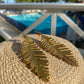 Long Plaintain Leaf earrings Nature’s Grace, Worn with Elegance